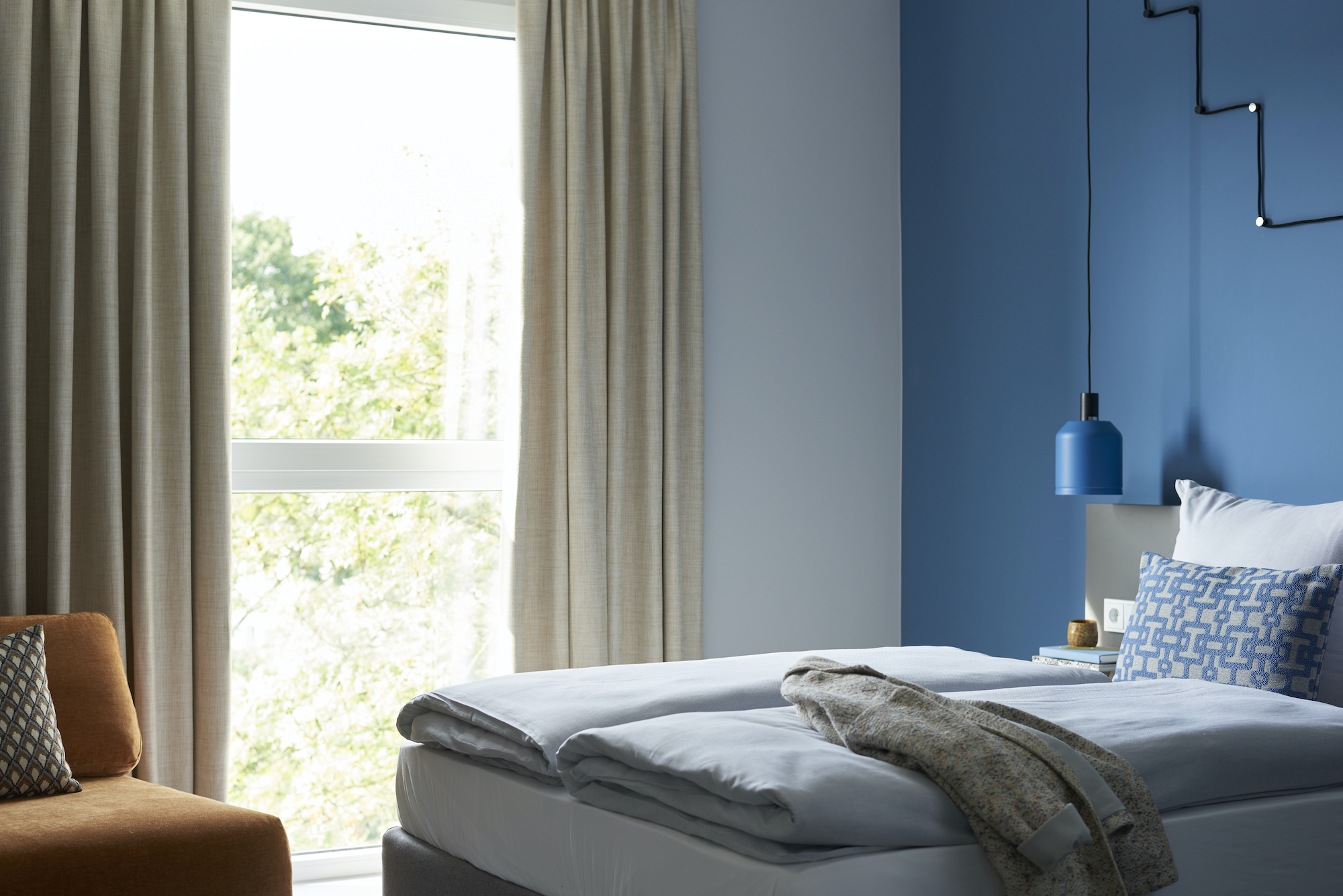 Schlafbereich und Blick ins Grüne