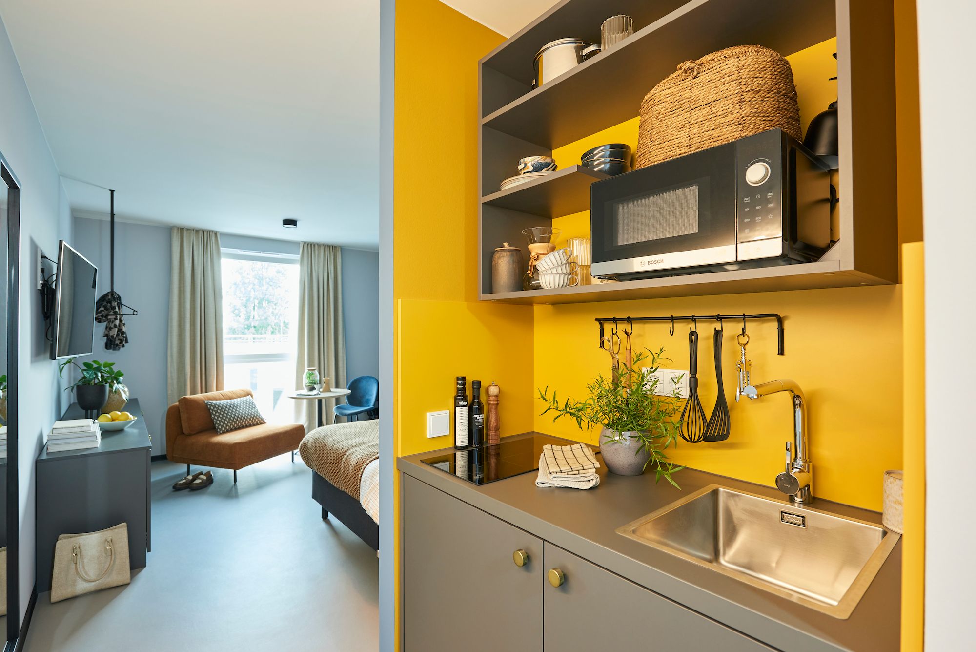 Nena Apartments Bochum Blick in das Apartment auf Küche, Schlaf- und Wohnbereich